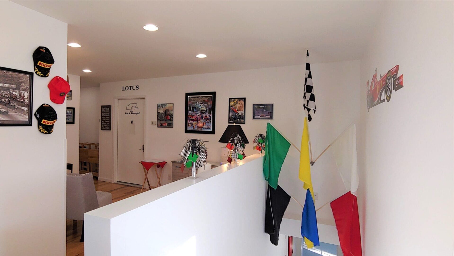 A room with many flags on the wall